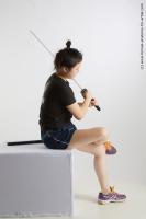 Photo Reference of sitting reference pose aera23